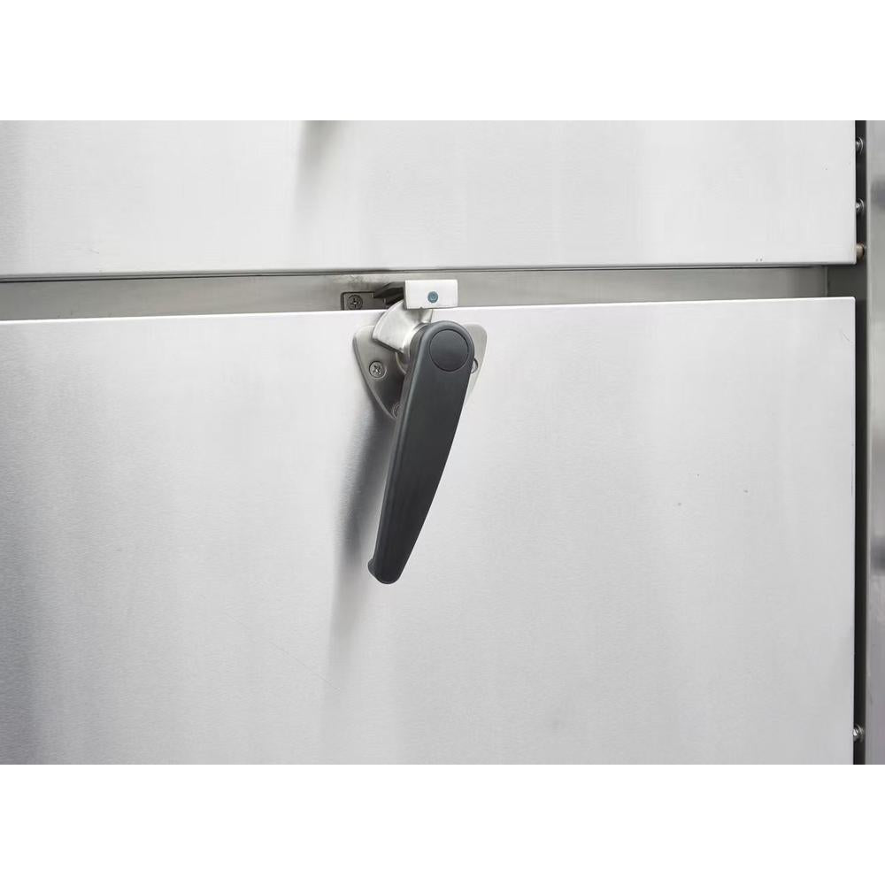 Close-up of the insulated door and black latch handle on a Dukers DCSC24 steam cabinet
