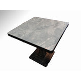 Grey marble-look restaurant tabletop with black edge band on a black cast iron pedestal base