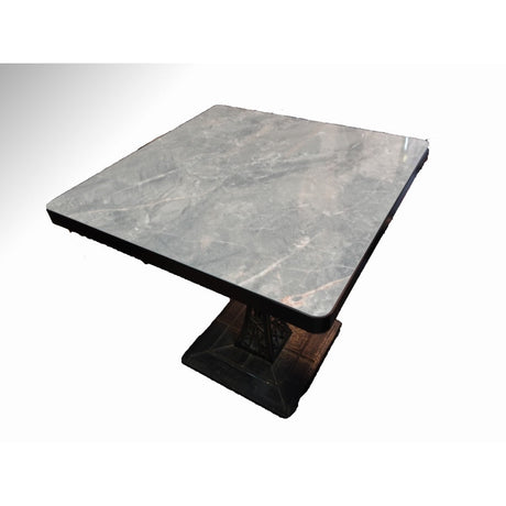 Grey marble-look restaurant tabletop with black edge band on a black cast iron pedestal base
