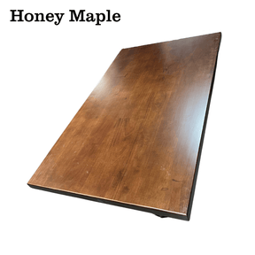 Honey maple restaurant tabletop with warm reddish brown stain and satin sheen