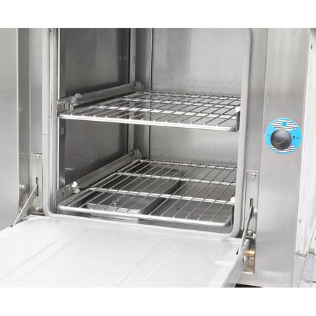 Interior of a Dukers DCSC24 steaming chamber with two removable stainless steel wire racks