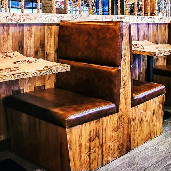 Wood panel booths with leather seats installed in a restaurant