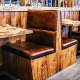 Wood panel booths with leather seats installed in a restaurant